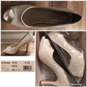 White laced peep toe shoes